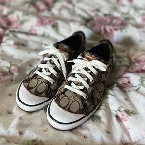Women’s Coach sneakers in a size 9!